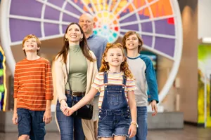 Family entering The Orlando Eye observation wheel