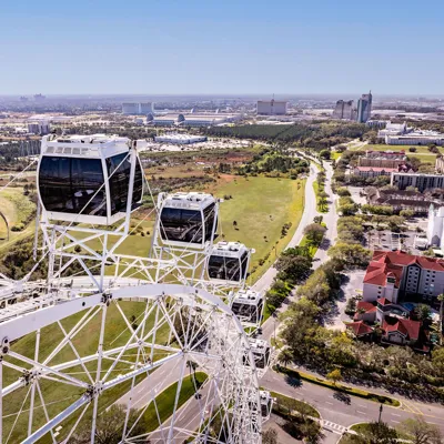 The Orlando Eye during the day overlooking Universal Blvd.