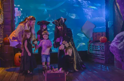 Captain Sebastian with family at Pirates of the Haunted Seas SEA LIFE Orlando event